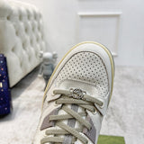 Side profile of Gucci classic monochrome sneakers low-top design