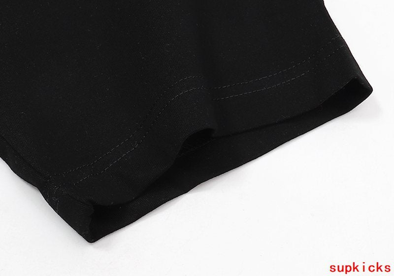 Close-up detail shot of Rhude luxury clothing with relaxed-fit cut