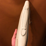 Close-up detail of poised bag design