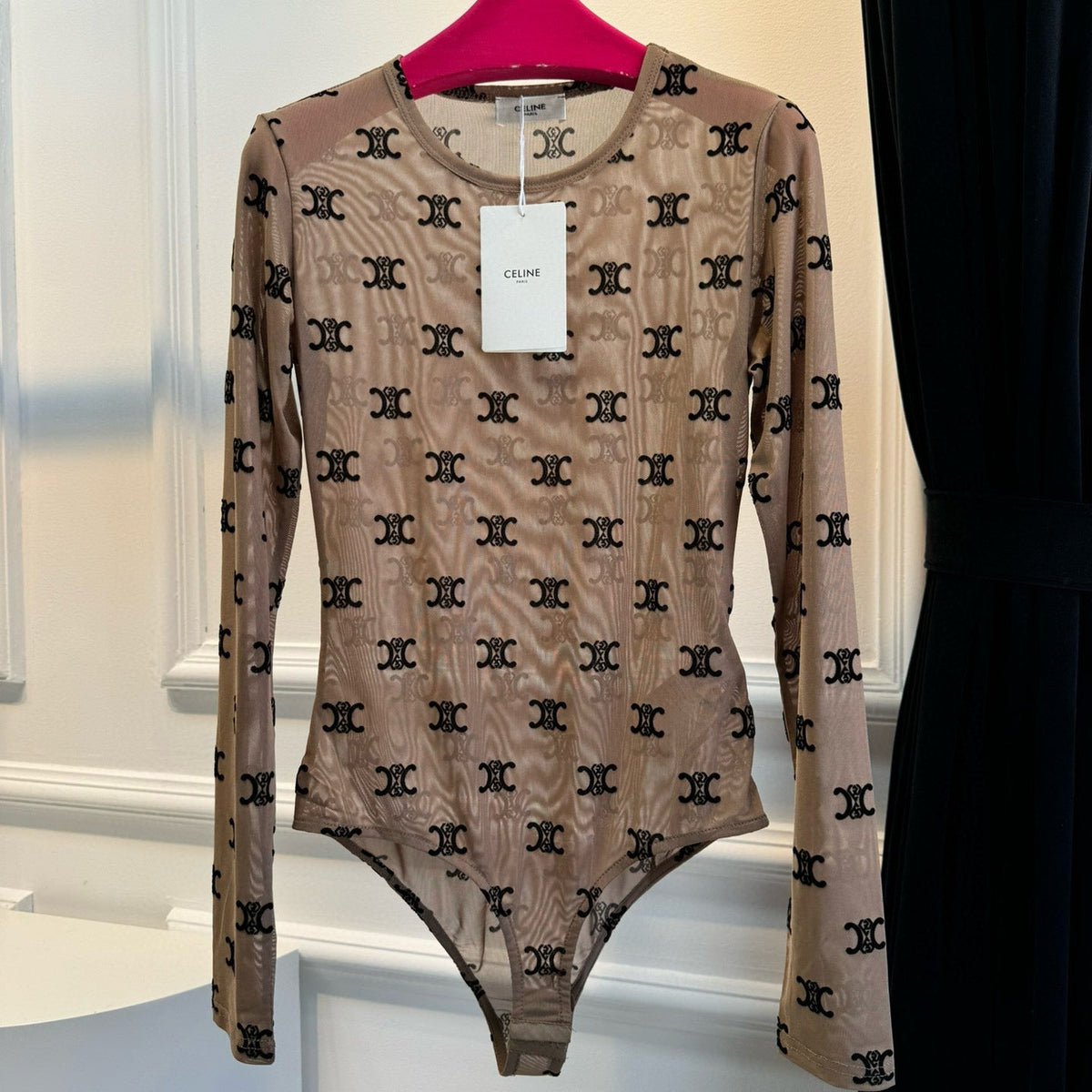 Back view of Celine luxury Bodysuit with clean finishing