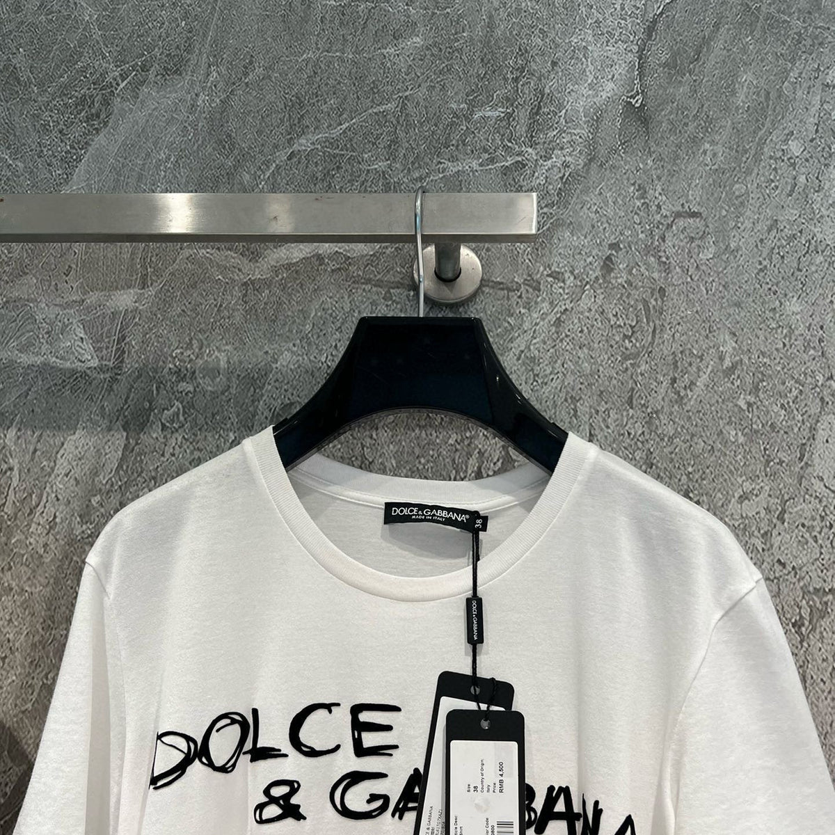 Front view of Dolce & Gabbana premium T-Shirt with iconic logo hardware