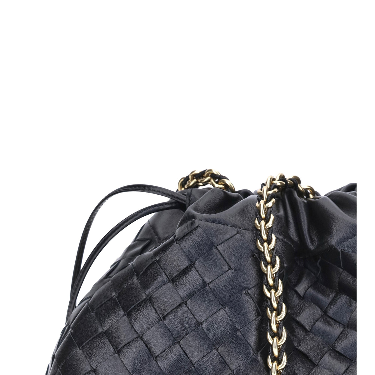 Close-up of Bottega Veneta clutches hardware and fine stitching