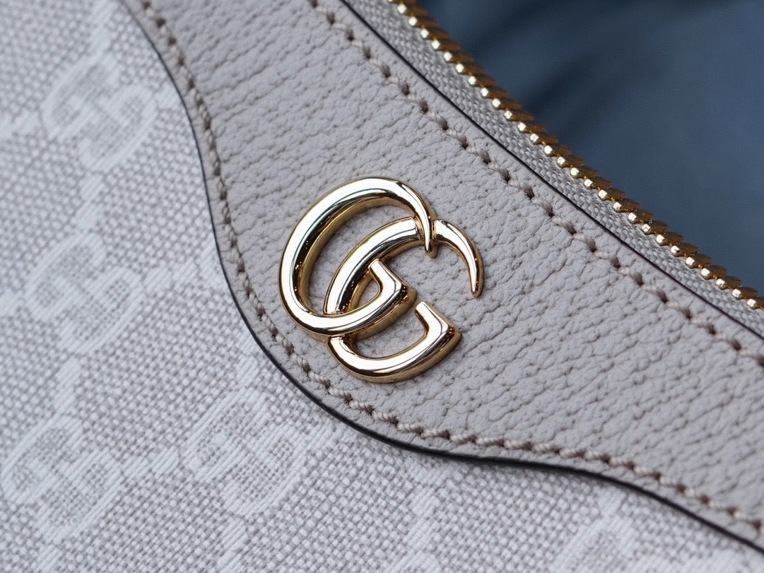 Gucci Fashion Item flat lay on neutral background