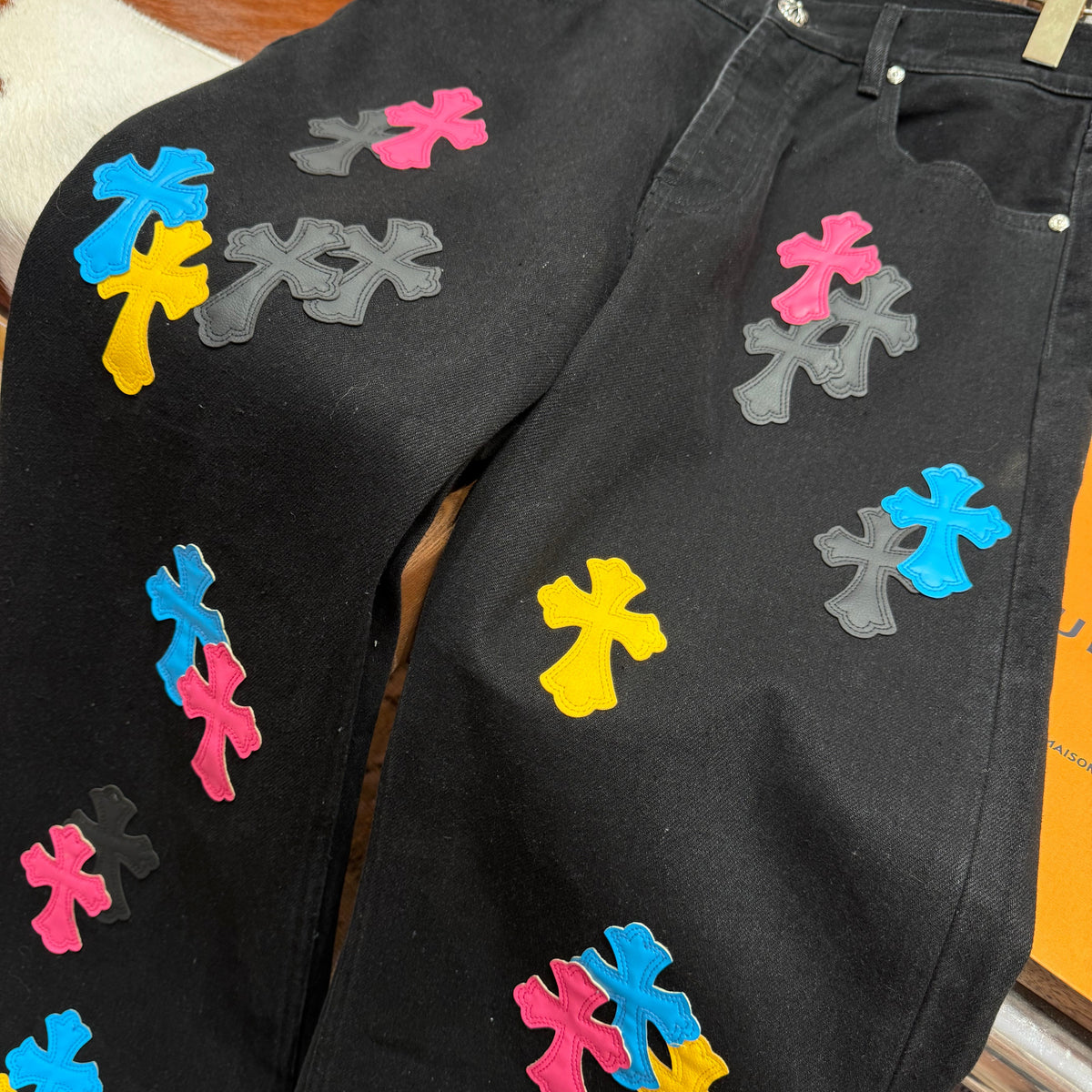 Detail shot of Chrome Hearts Jeans premium leather texture