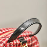 Front view of Chanel Tweed Backpack premium bag