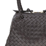 Close-up of Bottega Veneta shoulder bags hardware and fine stitching