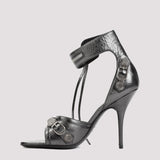 Close-up of Balenciaga sandals hardware and fine stitching