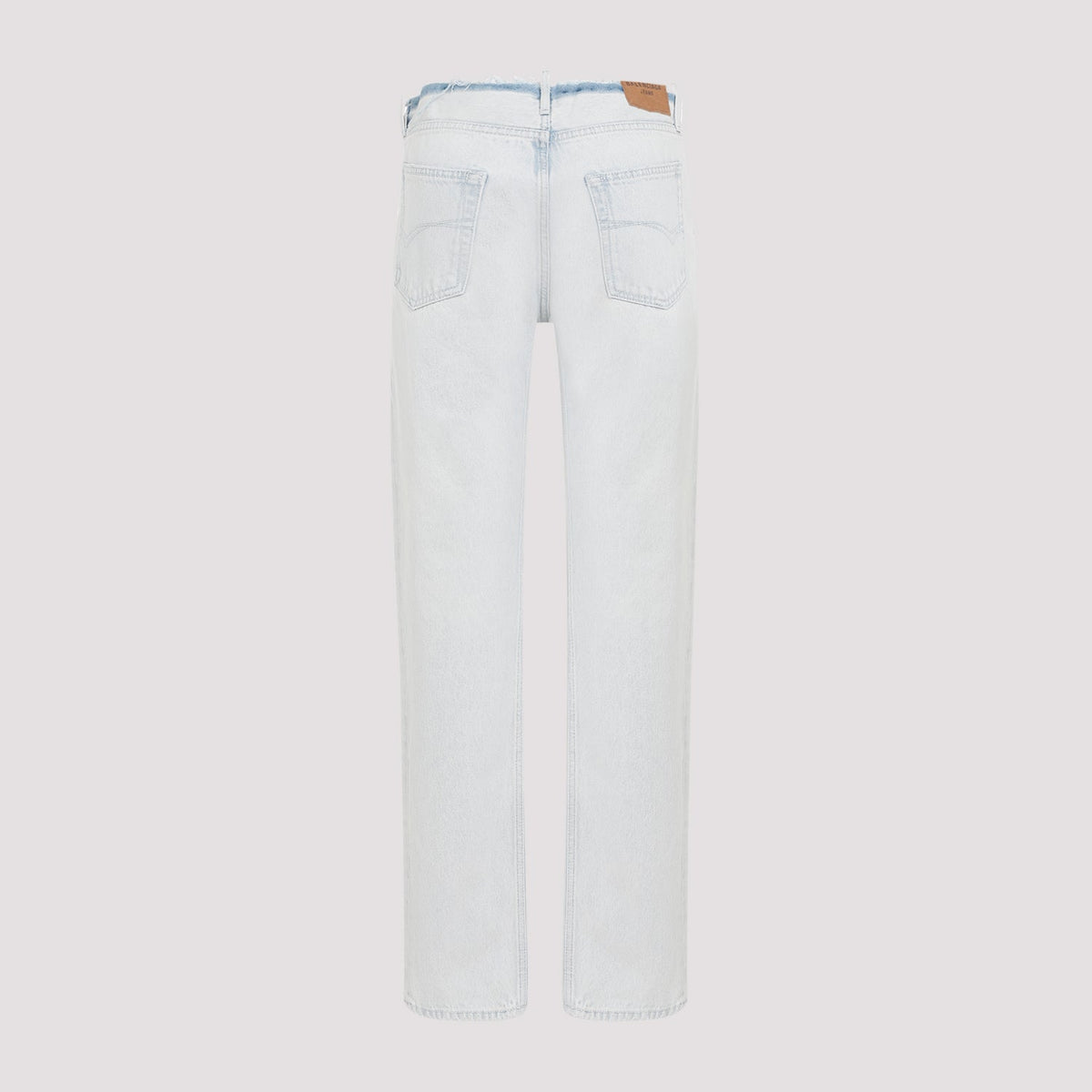 Close-up of Balenciaga trousers hardware and fine stitching
