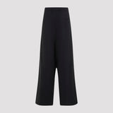 Close-up of Balenciaga trousers hardware and fine stitching