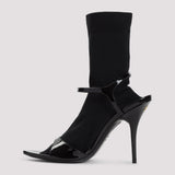 Close-up of Balenciaga ankle boots hardware and fine stitching