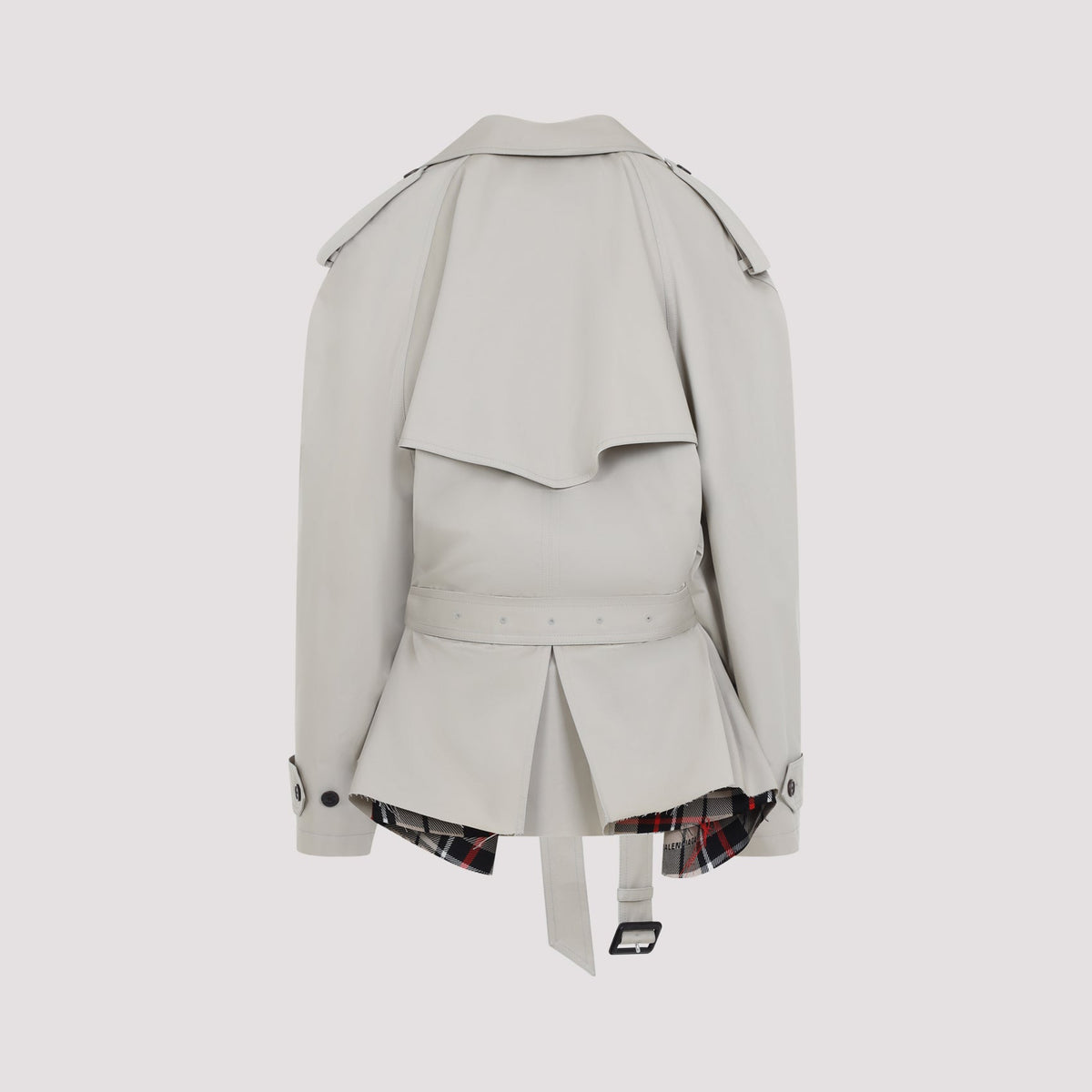 Close-up of Balenciaga coats hardware and fine stitching