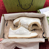 Front view of Gucci premium Sneakers with iconic logo hardware