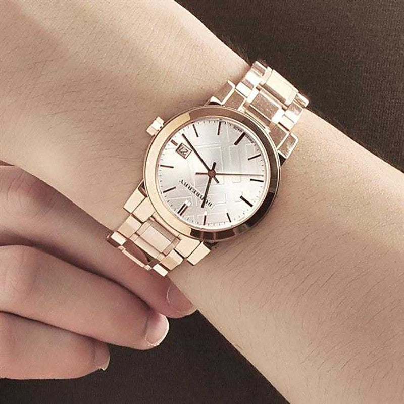 Front view of Burberry women's rose gold watch