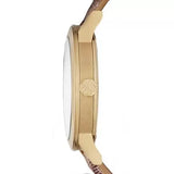 Close-up detail view of Burberry women's gold watch