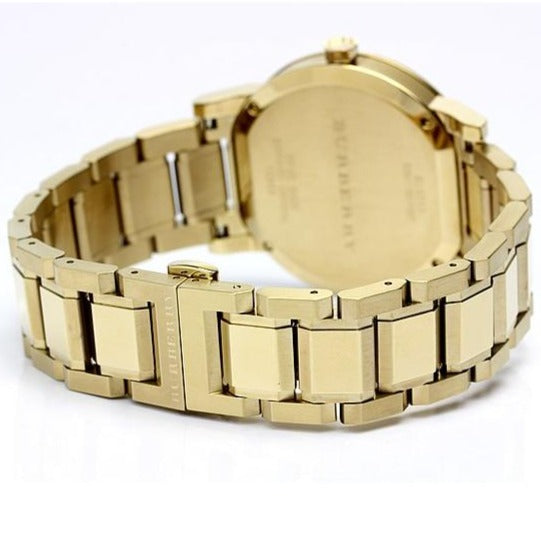 Lifestyle view of Burberry women's gold watch