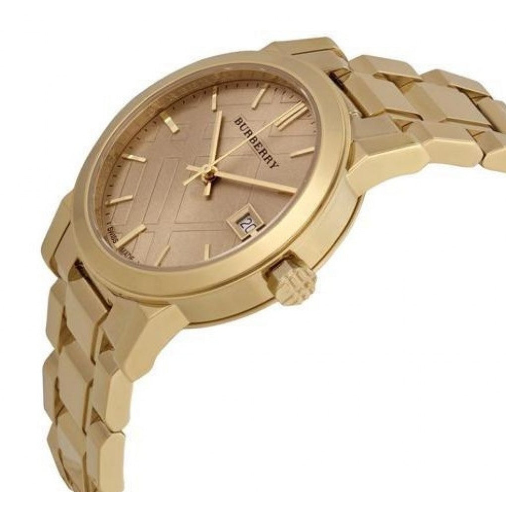 Side view of Burberry women's gold watch