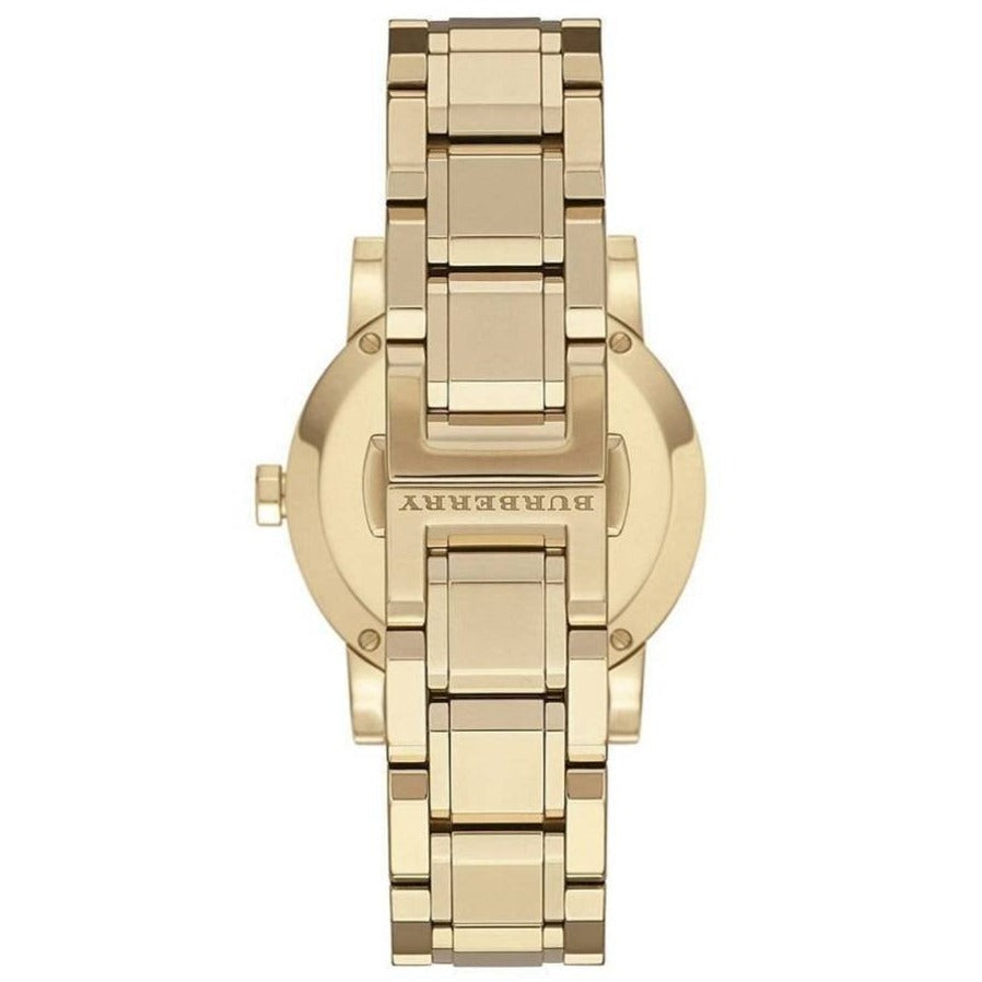 Lifestyle view of Burberry women's gold watch