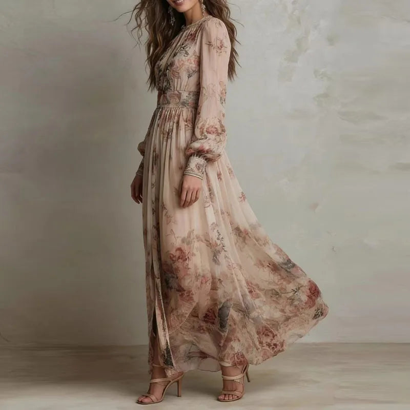 Woman wearing a long, floral-patterned dress against a neutral background