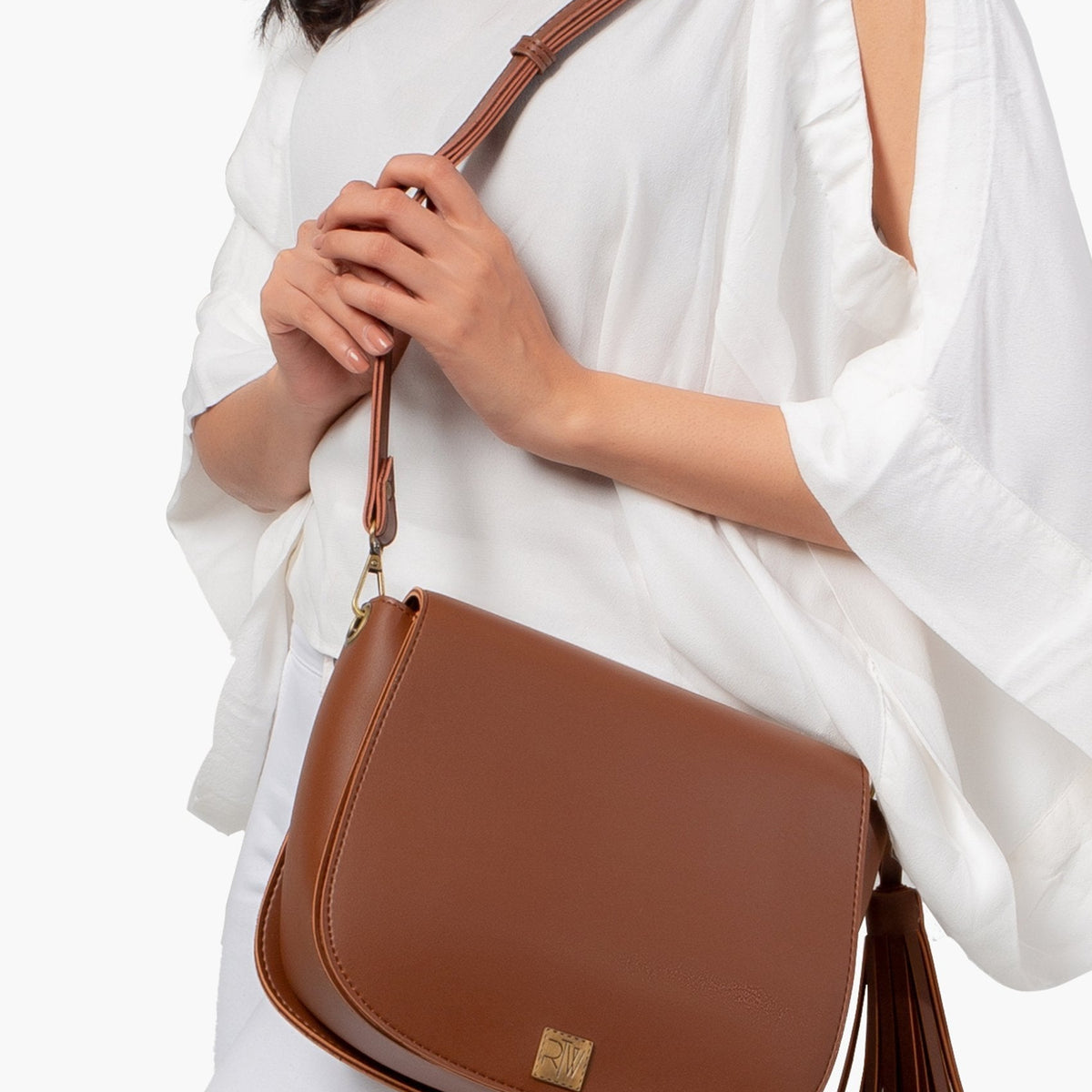 Ziva's Charm crossbody bag – side angle view (one versatile size)