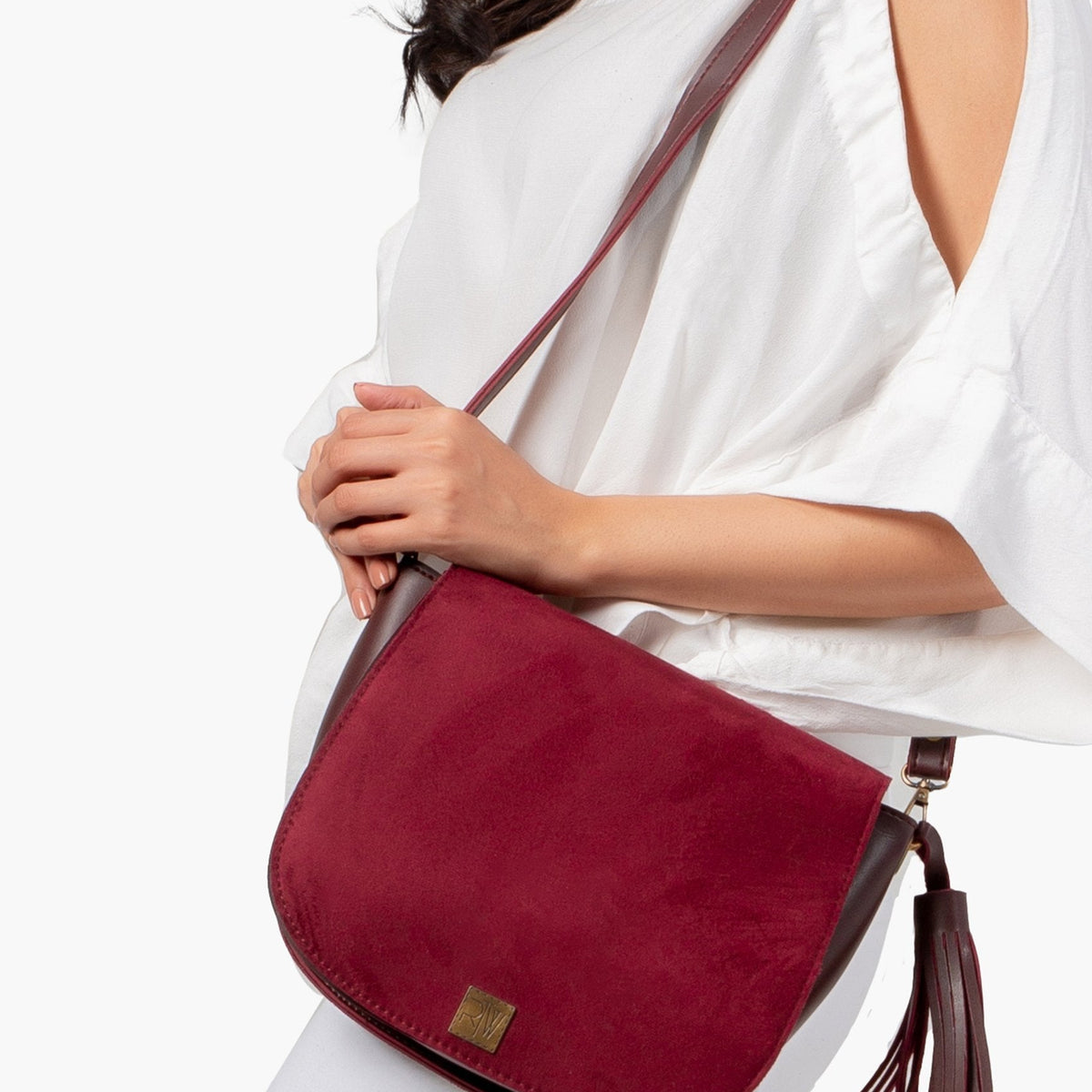 Ziva's Charm crossbody bag – side angle view (one versatile size)