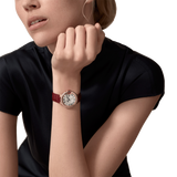 Close-up detail view of Cartier unisex rose gold watch