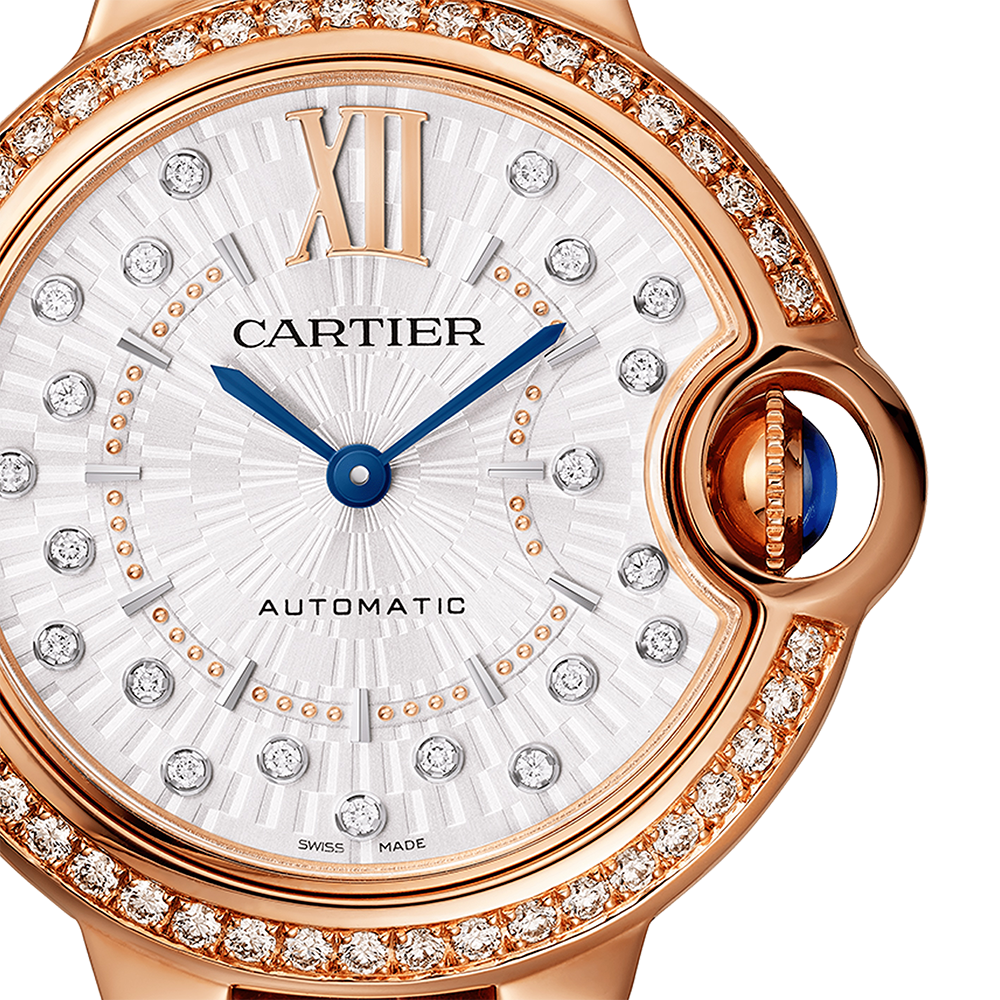 Side view of Cartier unisex rose gold watch