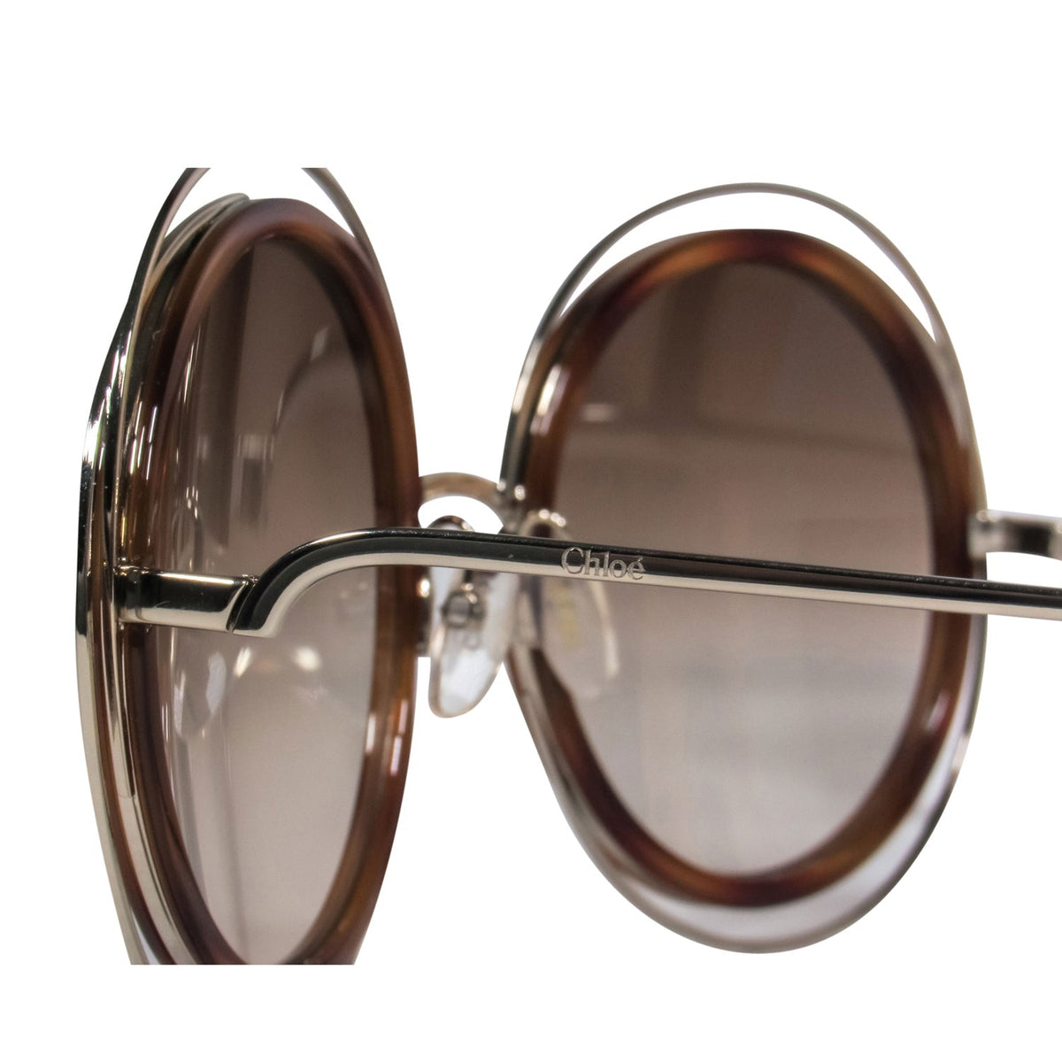 Auremantine elegant leather Sunglasses close-up detail