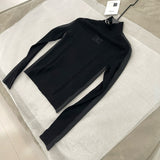 Chanel Turtleneck – luxury designer piece at Bellvora