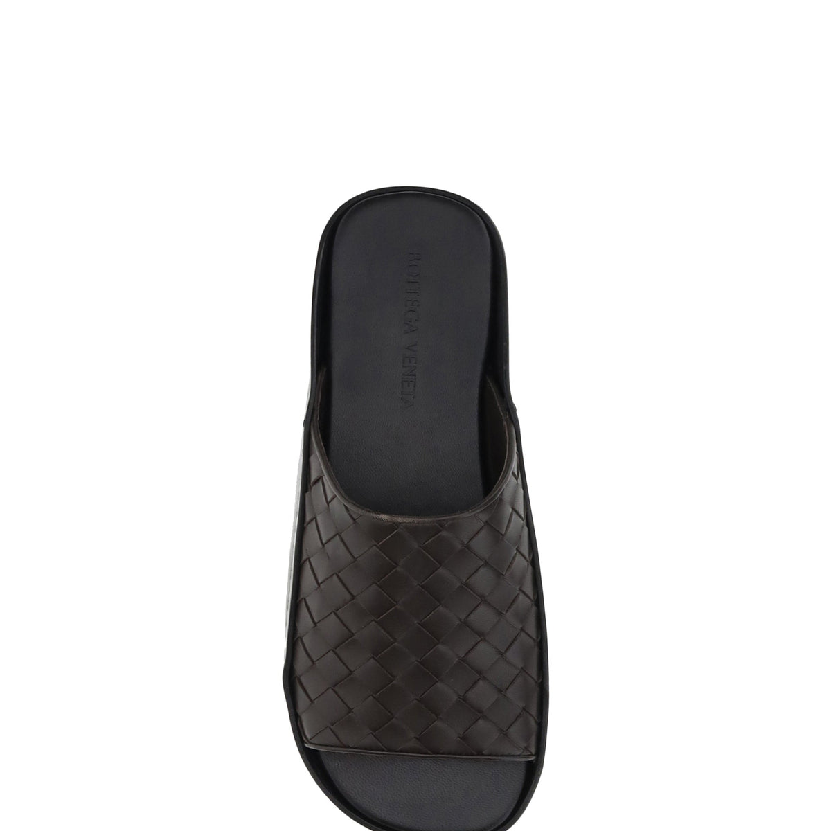 Close-up of Bottega Veneta sandals hardware and fine stitching