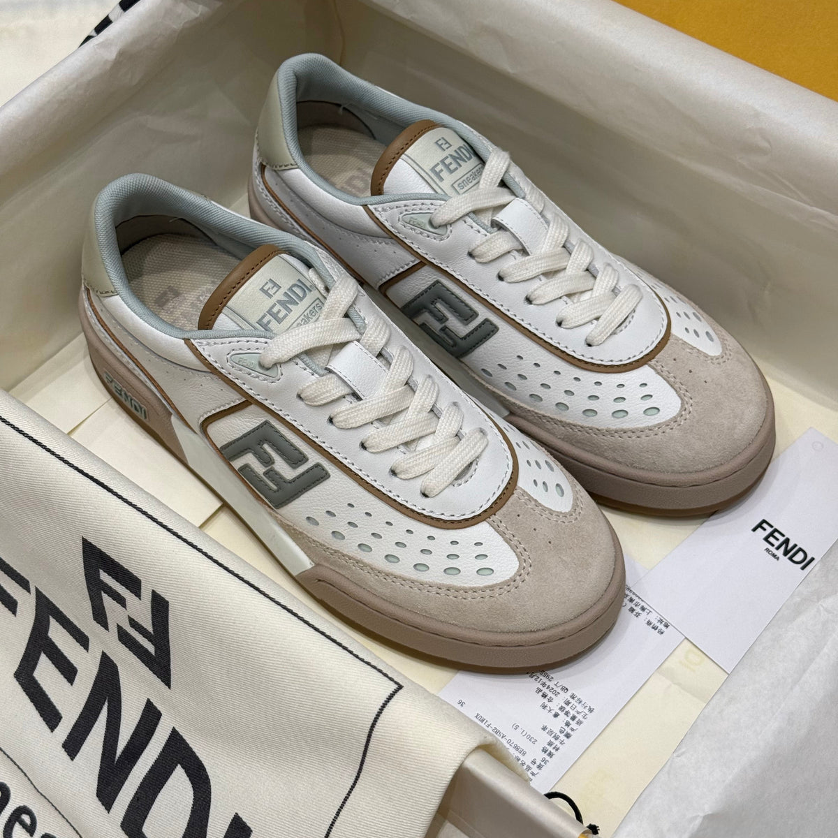 Front view of Fendi premium Sneakers with iconic logo hardware