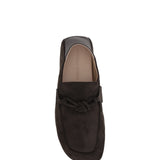 Close-up of Bottega Veneta slides hardware and fine stitching