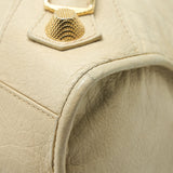 Side view of Balenciaga handbag Beige premium designer bag