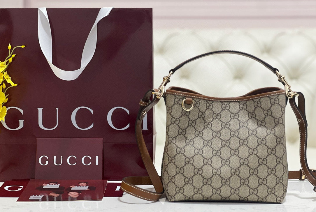Gucci Emblem Mini Bucket Bag – luxury designer bucket bag at Bellvora