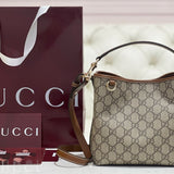 Gucci Emblem Mini Bucket Bag – luxury designer bucket bag at Bellvora