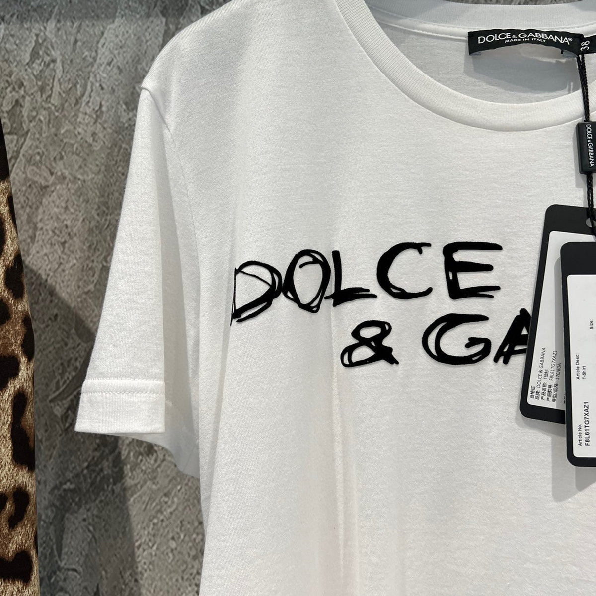 Side profile of Dolce & Gabbana T-Shirt showcasing structured silhouette