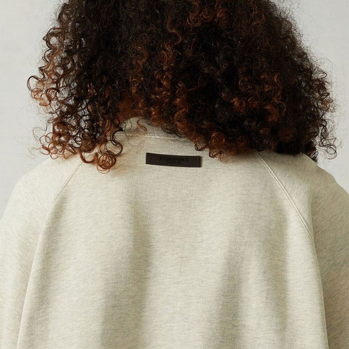 Front view of Fear of God Essentials Essentials Sweatshirt premium sweatshirt