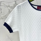 Close-up of Gucci Dress signature hardware and stitching detail