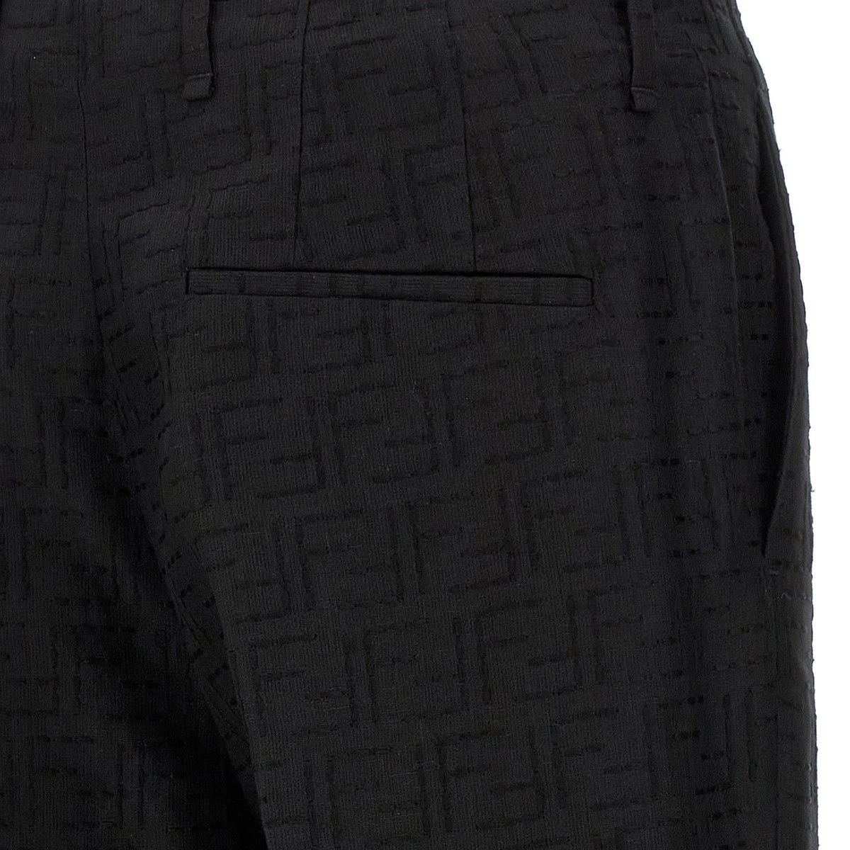 Close-up of Fendi pants hardware and fine stitching
