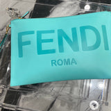 Close-up of Fendi wristlet clutch hardware and fine stitching