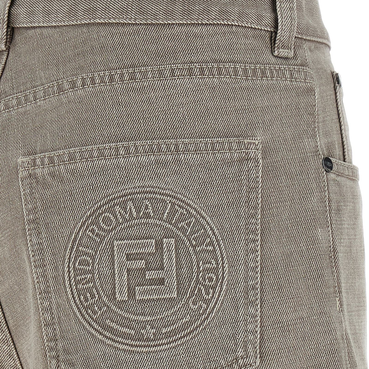Close-up of Fendi pants hardware and fine stitching