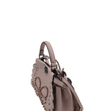 Close-up of Mini bags hardware and fine stitching
