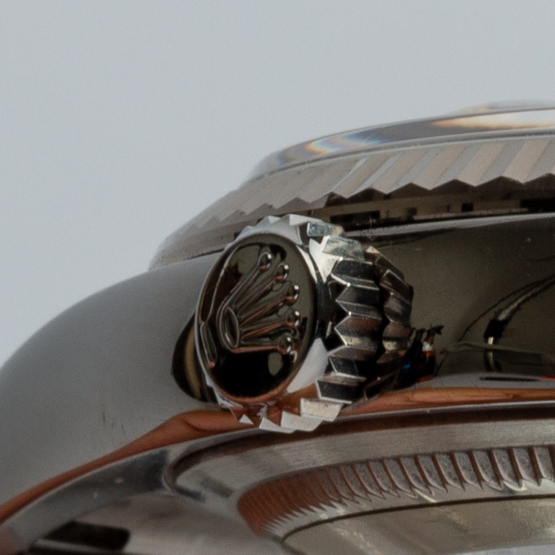 Side view of Rolex unisex watch