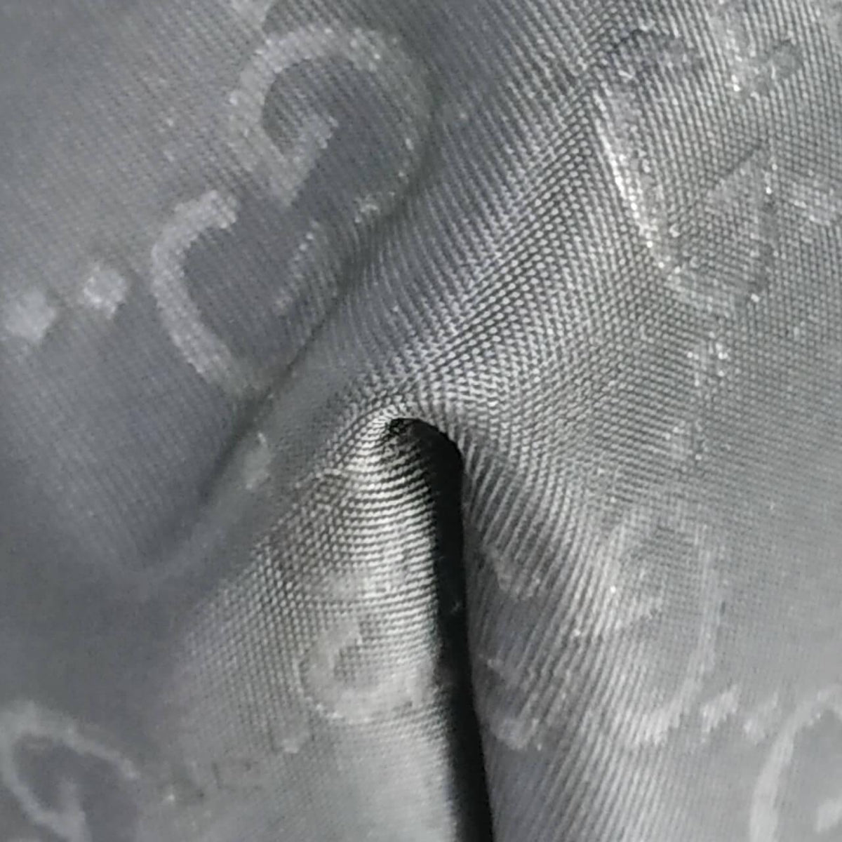 Close-up of Gucci bags hardware and fine stitching