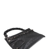 Close-up of Imprime bags hardware and fine stitching