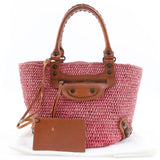Balenciaga designer tote bag straw closeup detail