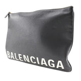 Balenciaga designer clutch leather closeup detail