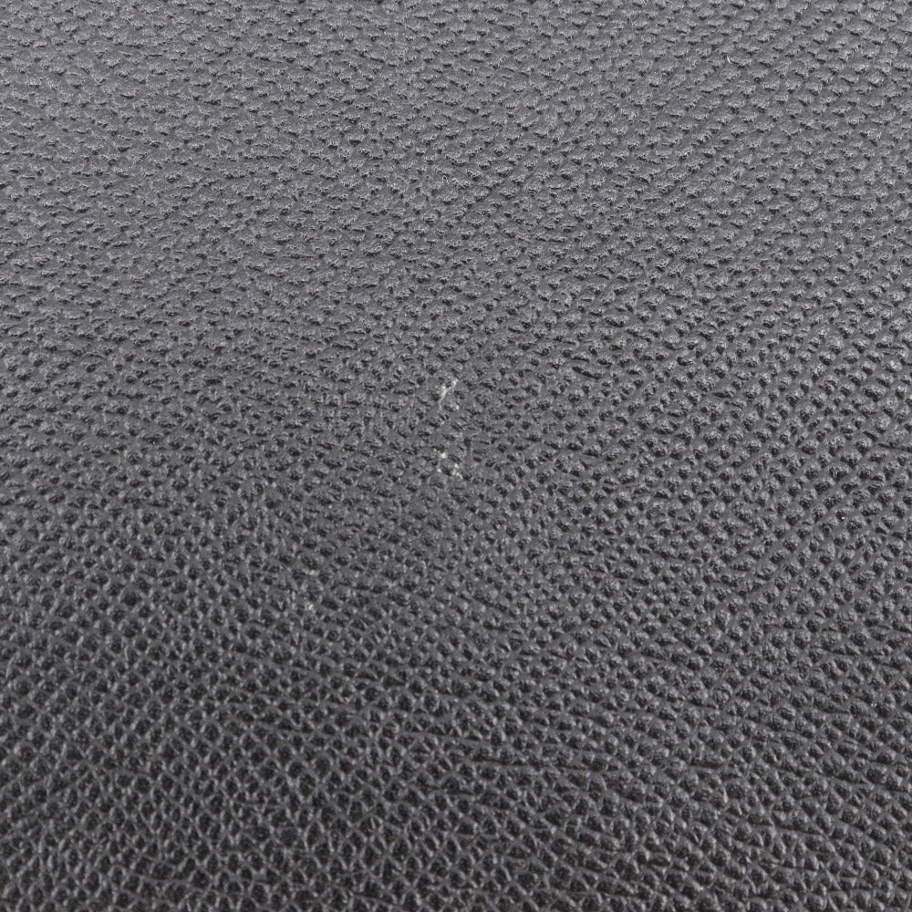 Balenciaga designer clutch leather closeup detail
