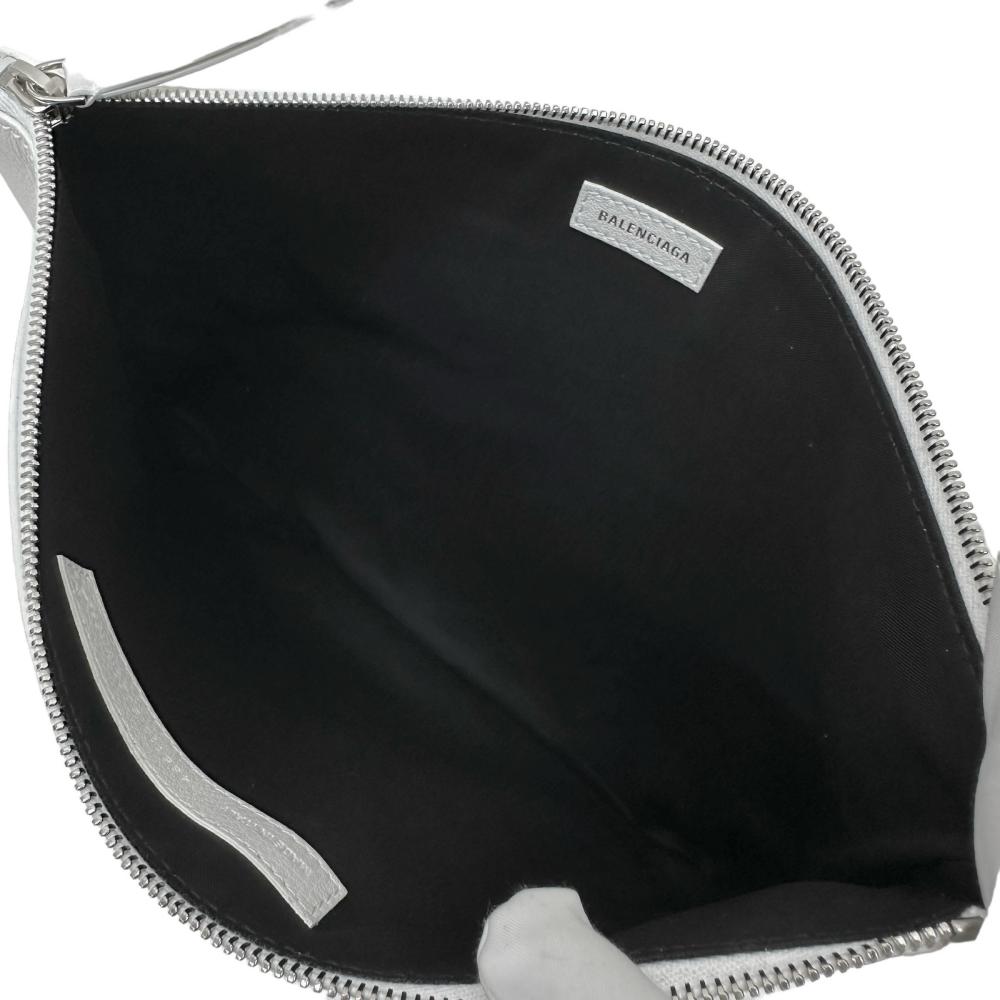 Balenciaga designer clutch leather closeup detail