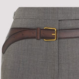 Close-up of Prada pants hardware and fine stitching