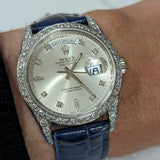 Side view of Rolex unisex gold watch